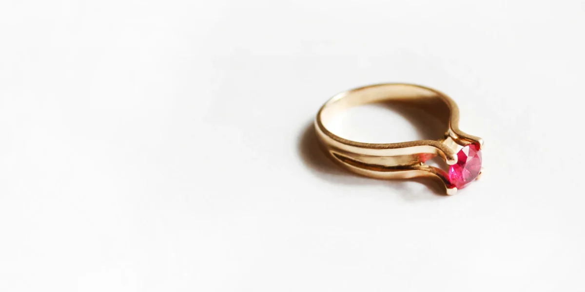 golden-ring-with-ruby-stone-on-white-background-2022-11-08-00-04-22-utc